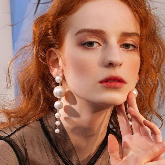 Pair Of Stylish Long Pearl Drop Tassel Earrings